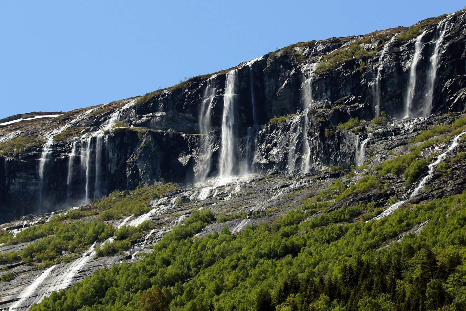 The 9 Brothers streaming waterfalls in Aga. © Arvid Aga.  www.arvid-aga.no